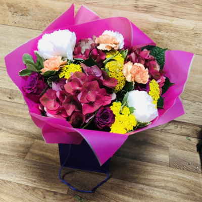 Cherry Blossom - A vibrant pink handtied simply stunning just like it’s inspiration - The Cherry Blossom Tree. Same day flower delivery by local florists - and the Cherry Blossom is a stunning choice.