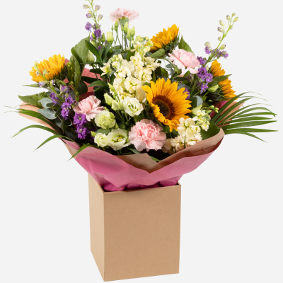 Bright Ideas Flower Bouquet - Beautiful Sunflowers and a peppering of other summer flowers and foliage. Tied in water and presented in a stylish bag. An amazing bouquet full of joy and delight ready to display and enjoy. These flowers will be hand delivered by the local florist.
