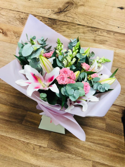 Pretty pink lily’s bouquet - Big head pink lilies with spray roses and eucalyptus tied with nice pink cello and pink aqua box